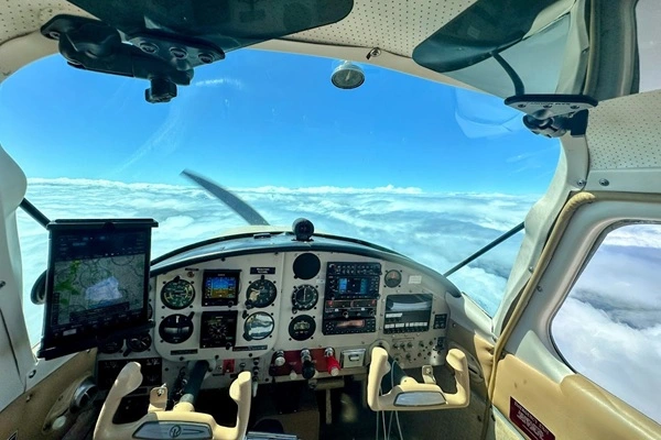 View from cockpit above the clouds