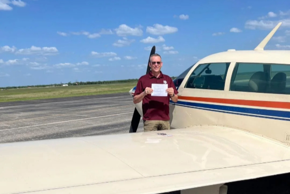 Pilot holding temporary airman certificate